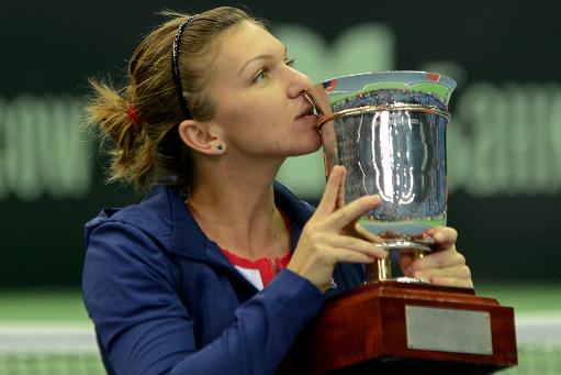 halep moscow beats stosur